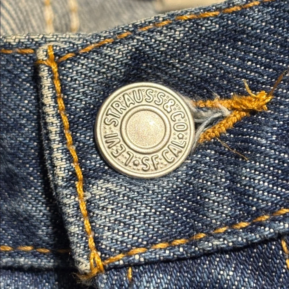 VTG Levi’s 517 Bootcut Jeans Made in USA 33x34 Red Tab Distressed Hem